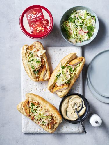 Pork schnitzel rolls with Obela Hommus mayo and slaw